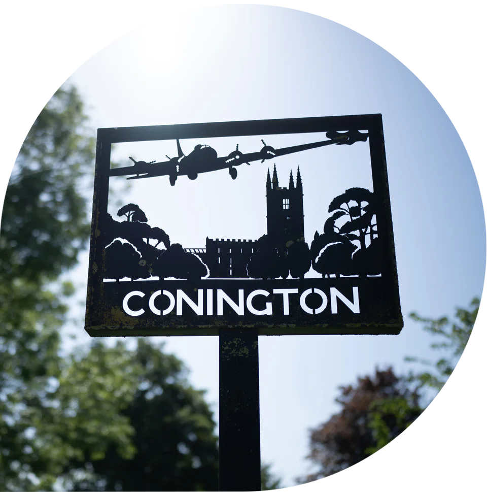 Conington village sign, home of the Designed Pilates studio
